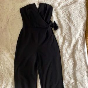 Black strapless jumpsuit size small.